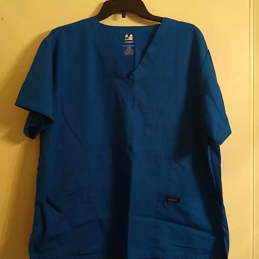 Royal blue scrub top, never woren